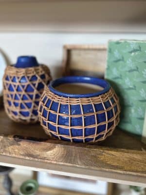 Up close view of the Rattan Wrapped Indigo Planter and Vase