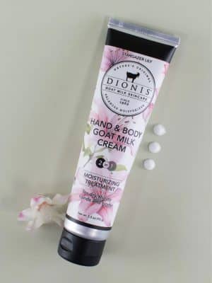 Dionis Stargazer Lily hand and body goat milk cream lotion packaging frontal view showing pink lillies.