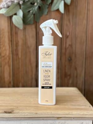 Diva Tyler Glam on Demand Room & Linen Spray 8 oz. bottle. A luxury fragrance mist designed to refresh rooms, linens, and wardrobes with a long-lasting scent.